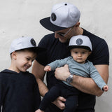 matching snapback summer sun hat signature grey with black logo cubs & co. Sydney, Australia