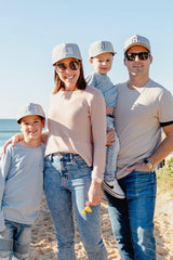 Family wearing matching personalised grey baseball caps with their initials. Cubs & Co. Australia.