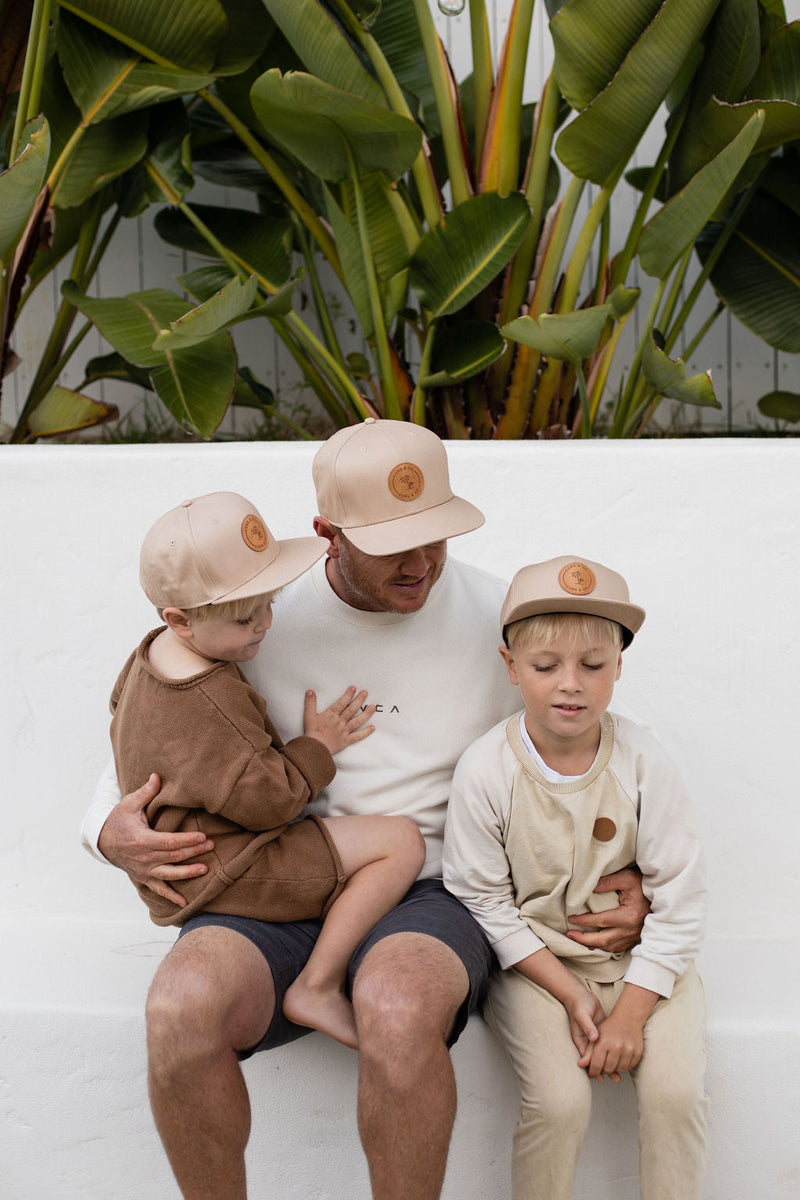 Matching father and son snapback hats